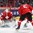 MONTREAL, CANADA - DECEMBER 30: Switzerland's Joren van Pottelgerghe #30 makes the save on this play while teammate Livio Stadler #5 looks on during preliminary round action against Denmark at the 2017 IIHF World Junior Championship. (Photo by Francois Laplante/HHOF-IIHF Images)

